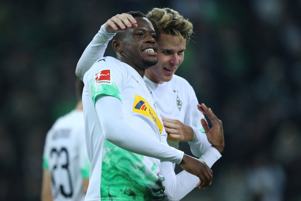 Could Zakaria (L) be on his way to Manchester United in the summer? (Photo by Christof Koepsel/Bongarts/Getty Images)