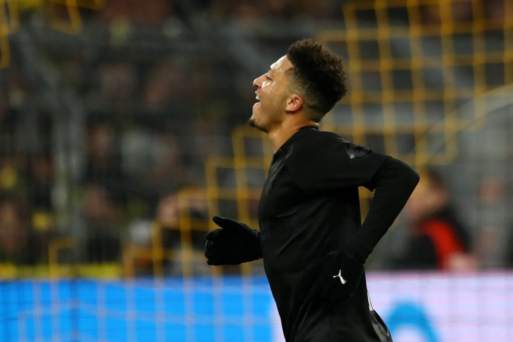 DORTMUND, GERMANY - DECEMBER 07: Jadon Sancho of Borussia Dortmund celebrates after scoring his team's third goal during the Bundesliga match between Borussia Dortmund and Fortuna Duesseldorf at Signal Iduna Park on December 07, 2019 in Dortmund, Germany. (Photo by Martin Rose/Bongarts/Getty Images)