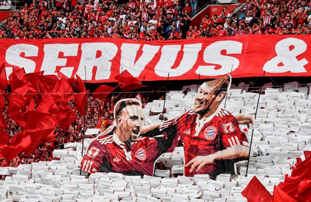 A dream farewell for one the best duos in world football. (Photo credit should read JOHN MACDOUGALL/AFP via Getty Images)