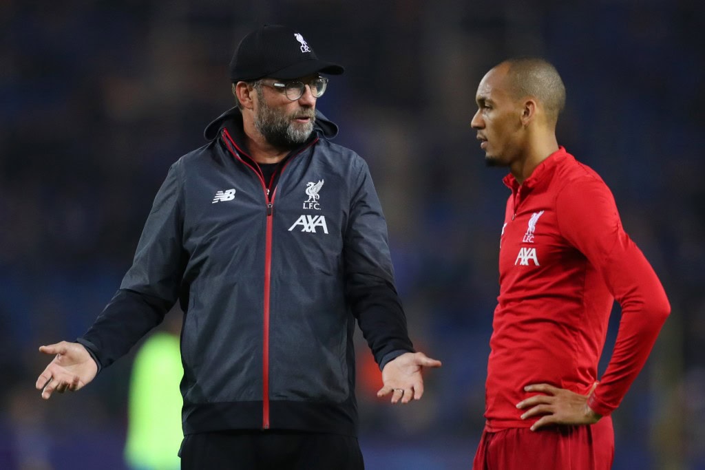 GENK, BELGIUM - OCTOBER 23: Jurgen Klopp, Manager of Liverpool talks to Fabinho of Liverpool prior to the UEFA Champions League group E match between KRC Genk and Liverpool FC at Luminus Arena on October 23, 2019 in Genk, Belgium. (Photo by Catherine Ivill/Getty Images)
