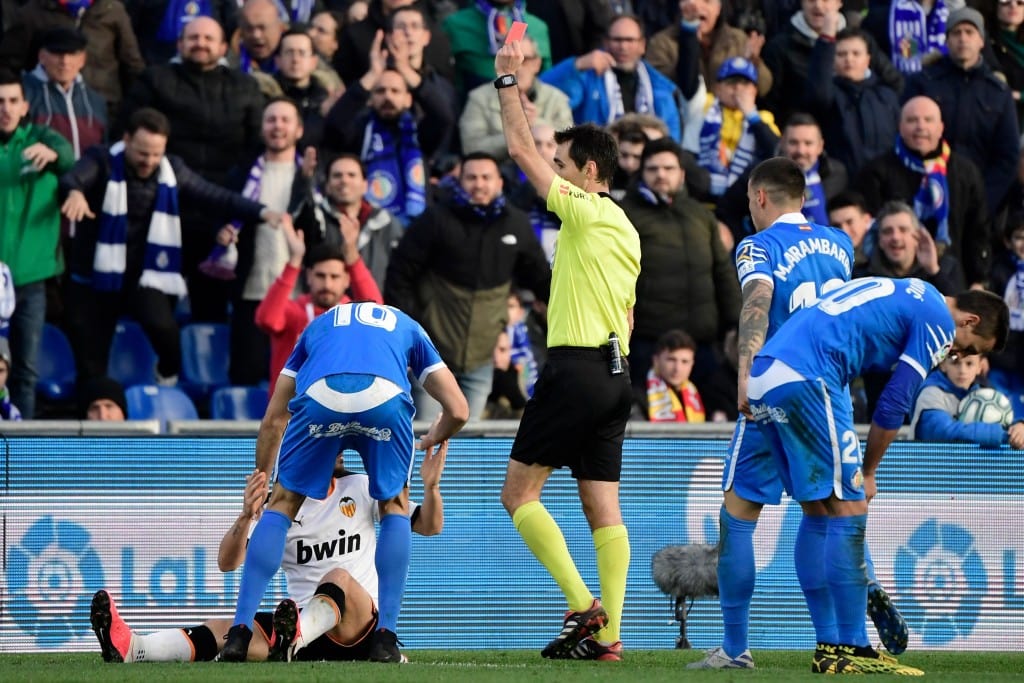Alessandro Florenzi (in white) is suspended after being sent off against Getafe last week. (Photo by Javier Soriano/AFP via Getty Images)