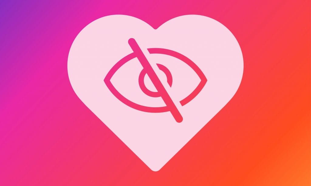 Un oeil barré dans un cœur qui symbolise la fin des likes sur Instagram