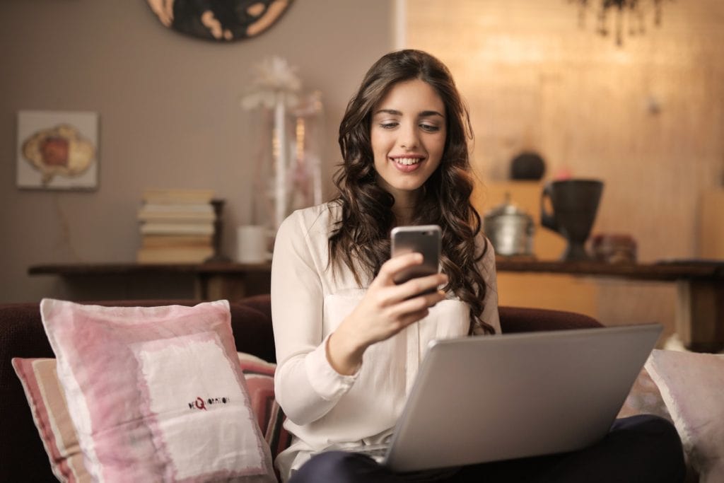 Girl checking contact list (Can Overcome Loneliness)