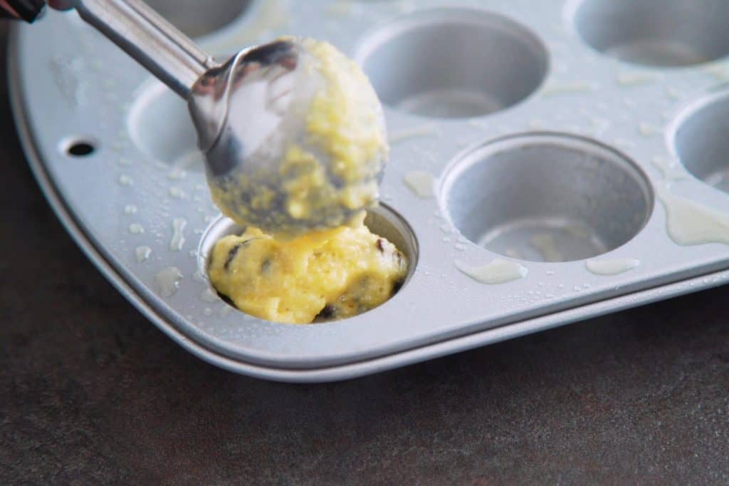 Distribute GF Cornbread batter into Mini Muffin Tins