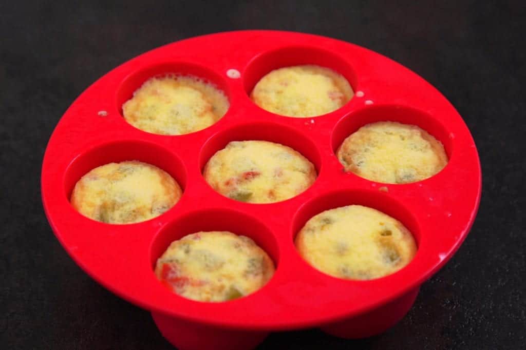 After natural pressure release, remove instant pot sous vide egg bites from machine and cool slightly.