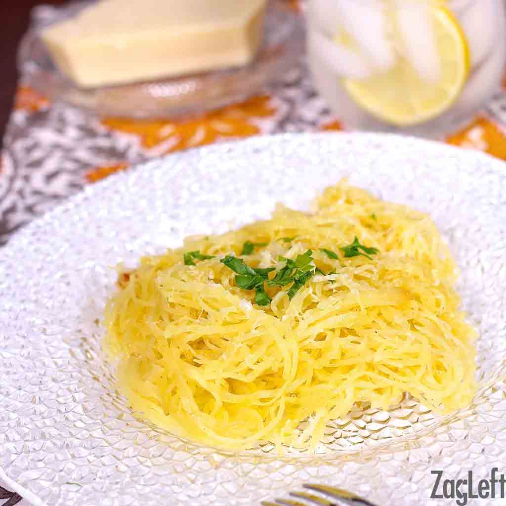 A closeup of Spaghetti Squash on a glass plate