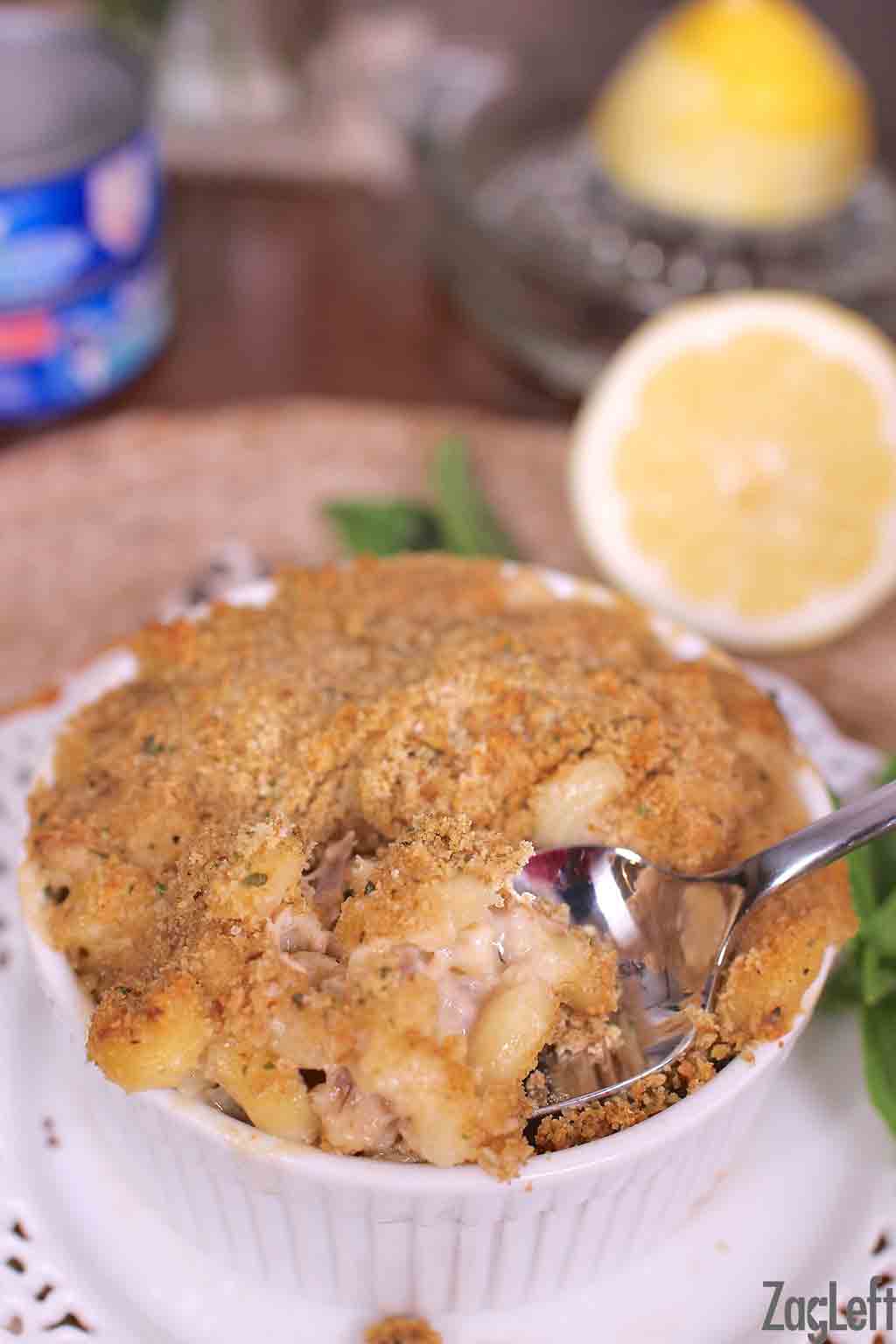 A closeup of a spoonful of tuna casserole in a small bowl