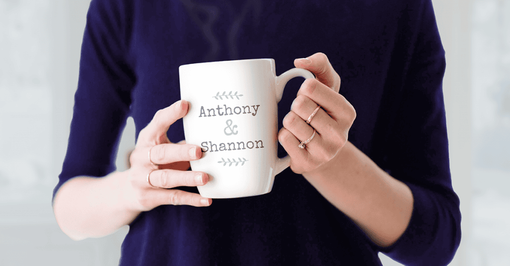 woman's hands holding personalised mug