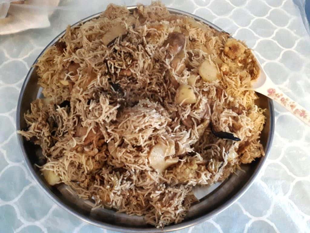 Chicken Maqluba with Potatoes, cauliflower and eggplant in a large plate