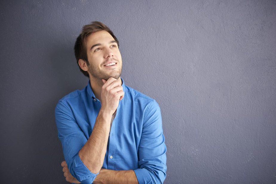 A guy is thinking about something (or someone) nice and beautiful