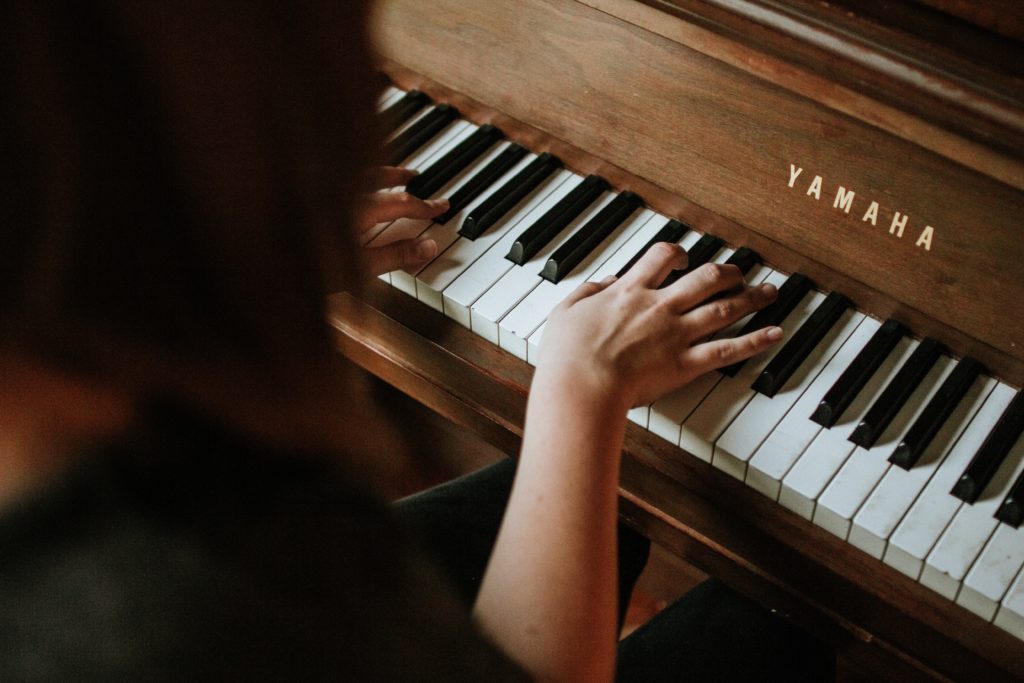Female Playing Yamaha Piano