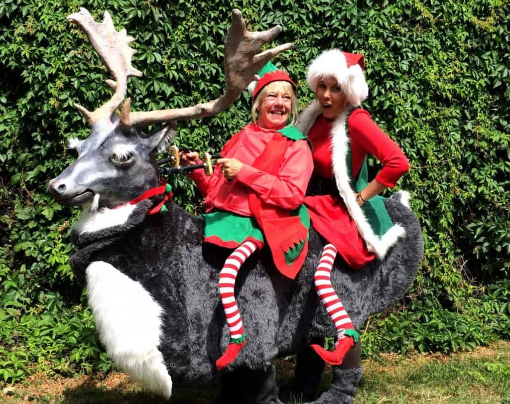 Reindeer & Christmas Elves Walkabout act for hire. Our meet and greet act is available to book for Christmas-themed events in London & the UK.