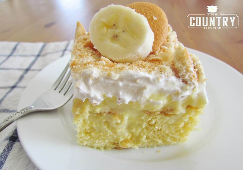 Banana Pudding Poke Cake recipe from The Country Cook, with sliced banana and Nilla wafer