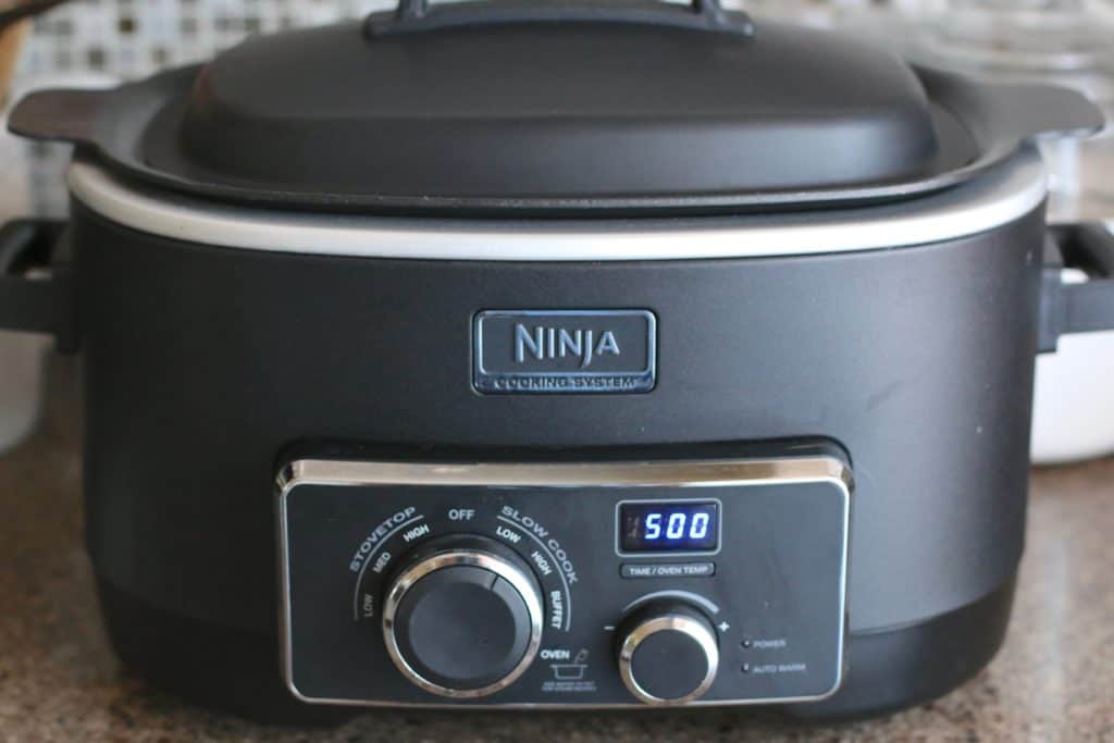 covered Ninja slow cooker set for five hours