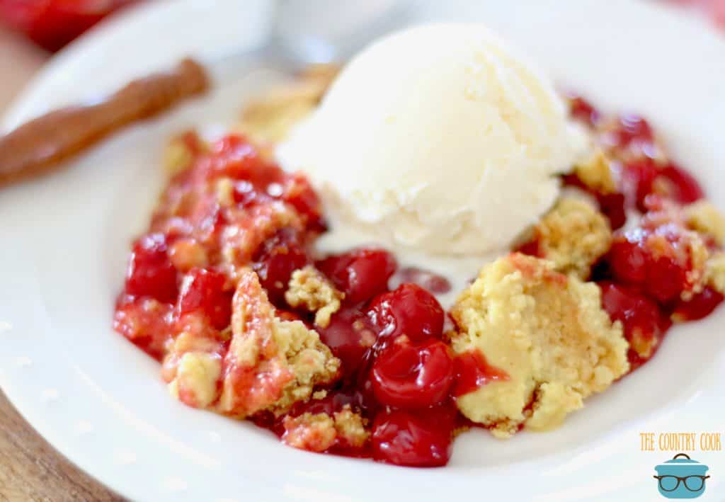 Easy Cherry Dump Cake with a scoop of vanilla ice cream