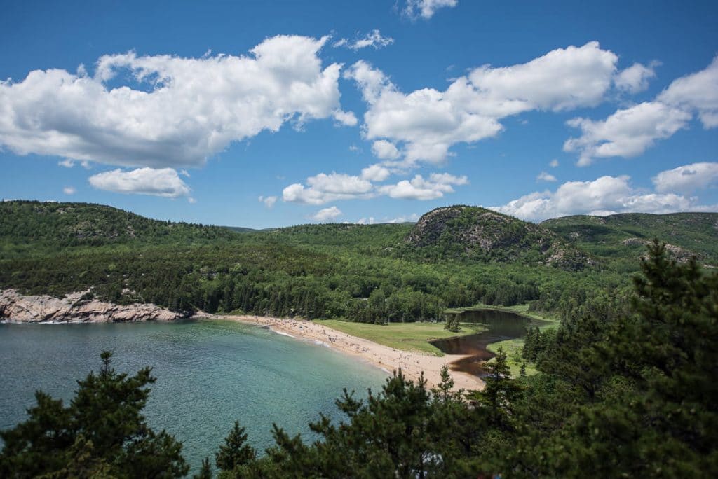 View of Sand Beach from a viewpoint on the Great Head Trail, once of the many hikes in Acadia