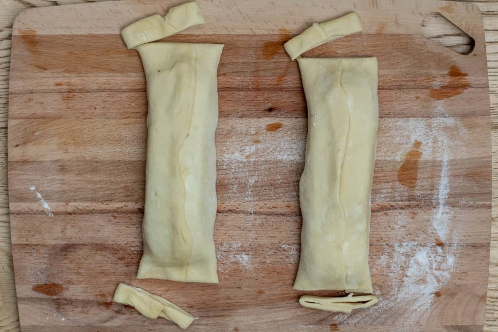 2 puff pastry salmon wellington packets with edges cut off