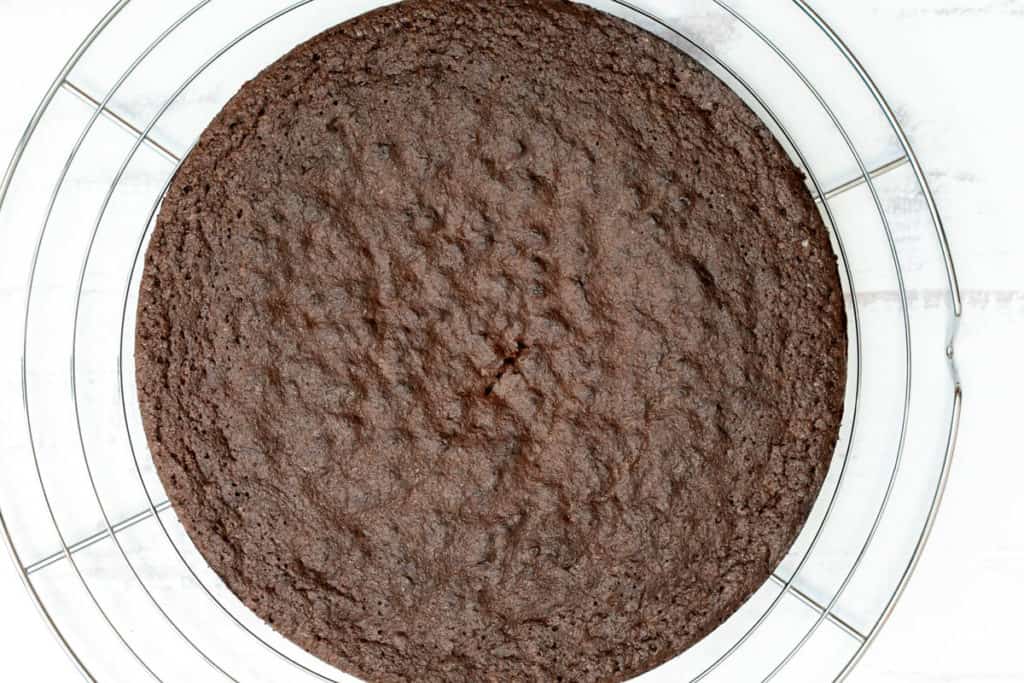 almond flour chocolate cake on cooling rack