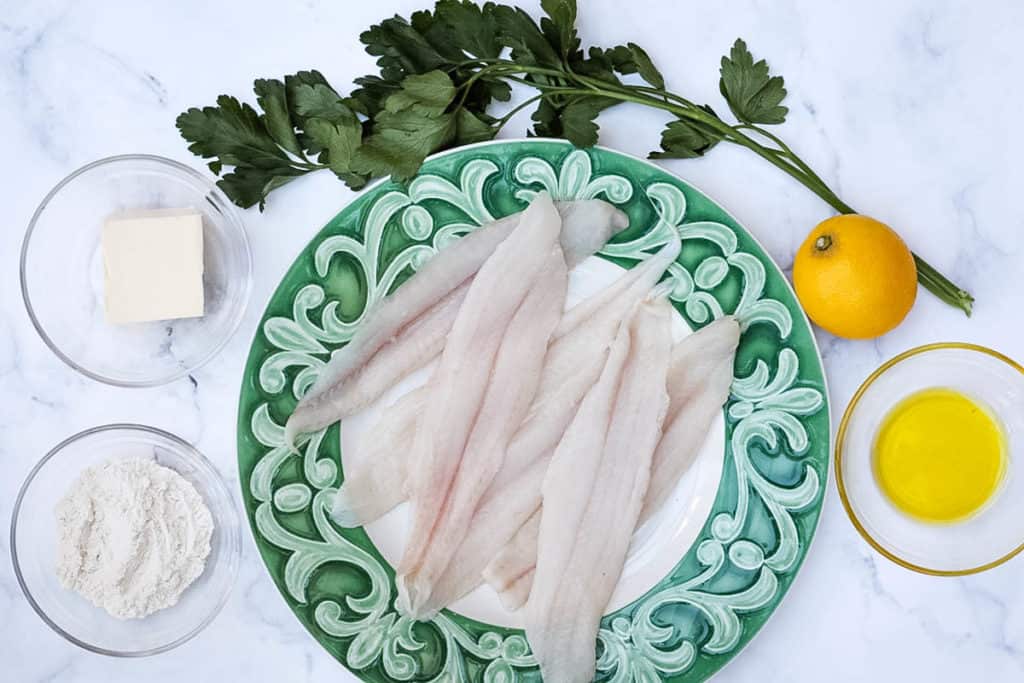 Ingredients for sole meuniere: sole, lemon, olive oil, flour, butter, parsley