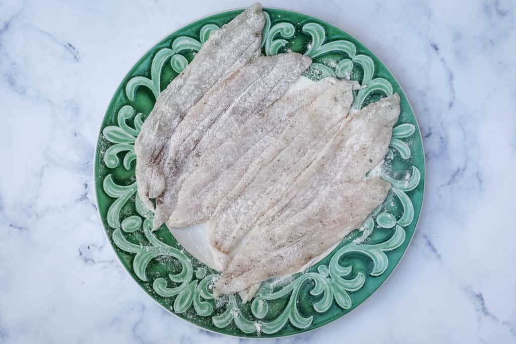 Sole fillets with salt, pepper, and flour