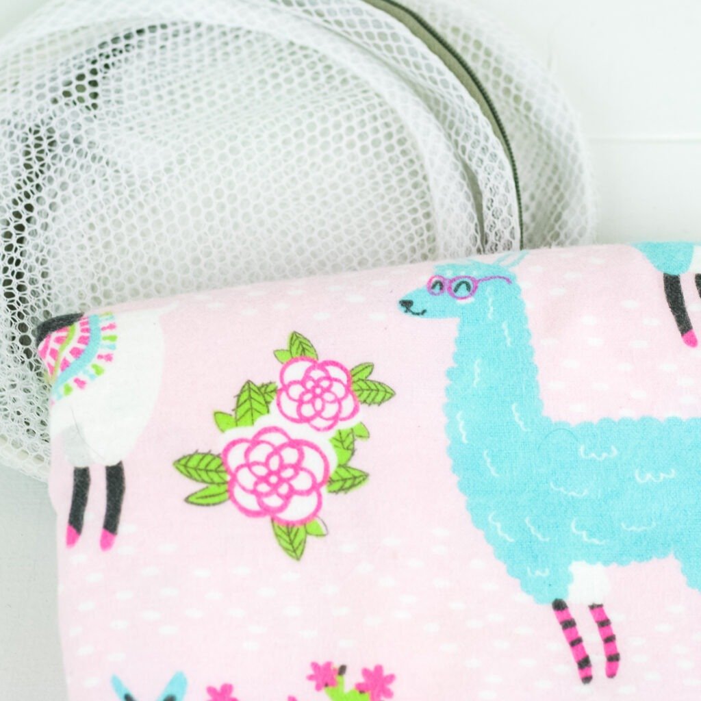 Learn to line a crochet blanket with fabric. This written and video tutorial will show you how to sew a liner in by hand or sewing machine.
