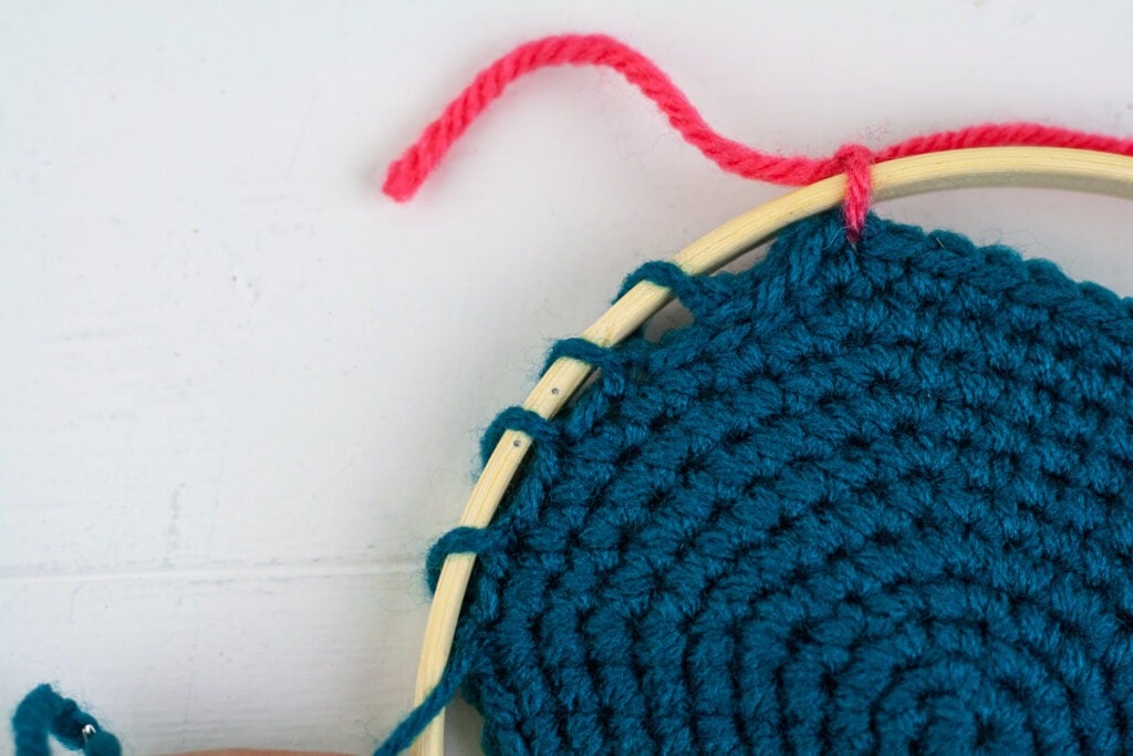 Learn how to make embroidery crochet rose wall hanging. You will be using your crochet skills and follow the video tutorial to learn to embroider.