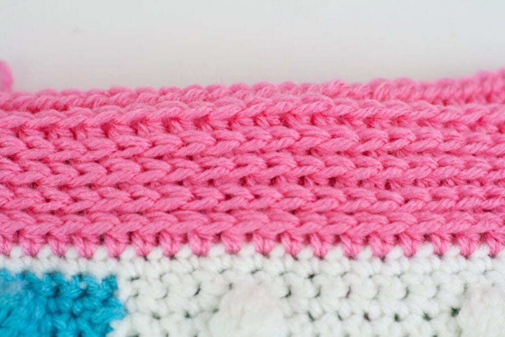The Camel Stitch blanket border will work for any blanket. Free crochet pattern and video tutorial for the knit like blanket border.
