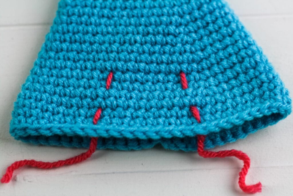 Crochet a baby gnome with this free crochet pattern. This gnome will make a wonderful gift for a baby shower or expecting mother.