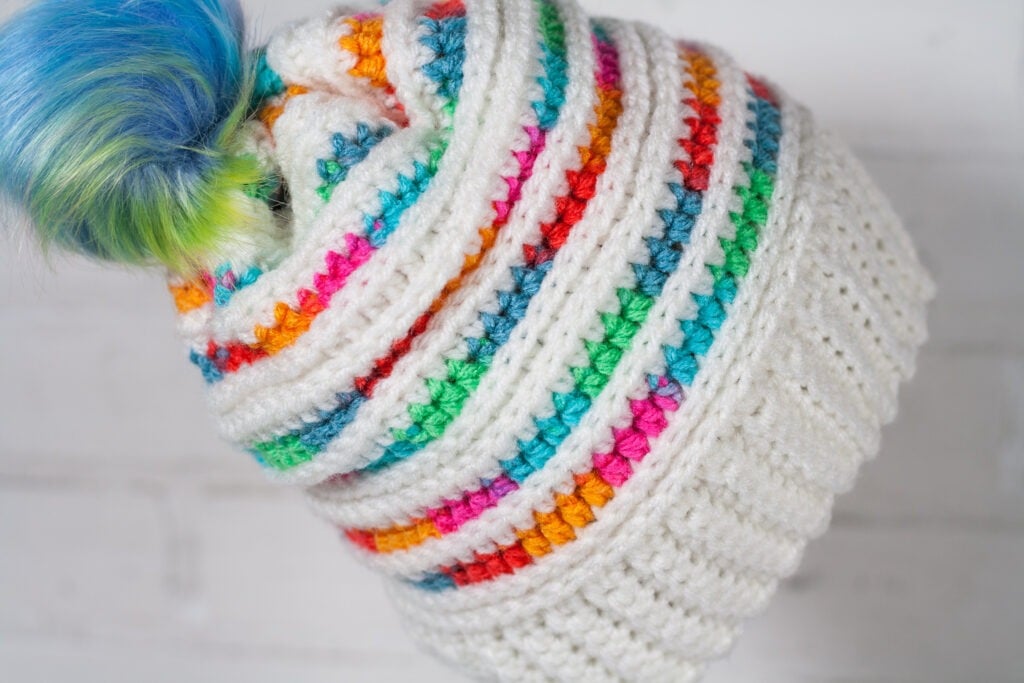 You will love the prismatic crochet beanie pattern and its balance of color. It works up quickly and has a helpful video tutorial.