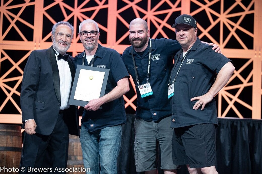 Cannonball Creek Brewing Co accepting gold for Trump Hands, their Session IPA, at the 2018 World Beer Cup