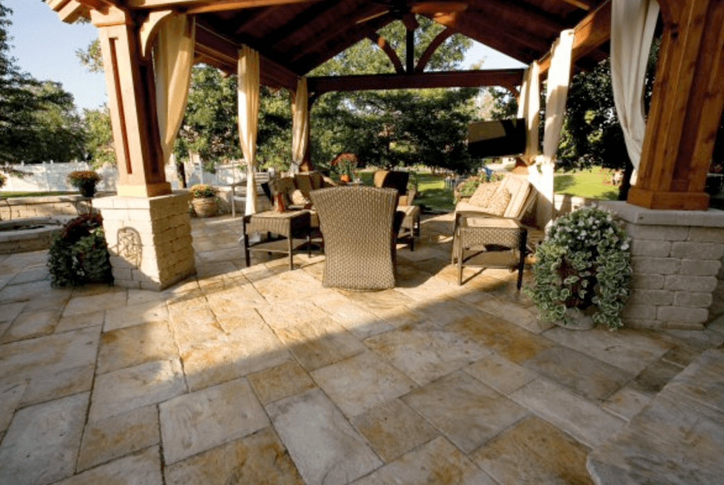 HANG SOME CURTAINS TO MAKE A PATIO LOOK MORE BEAUTIFULL