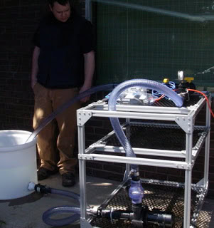 Pumping water in the parking lot (Em4 test).