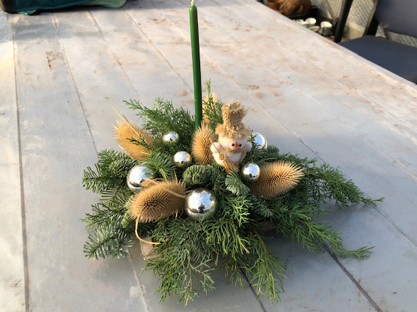 Kerststukjes en koopavond