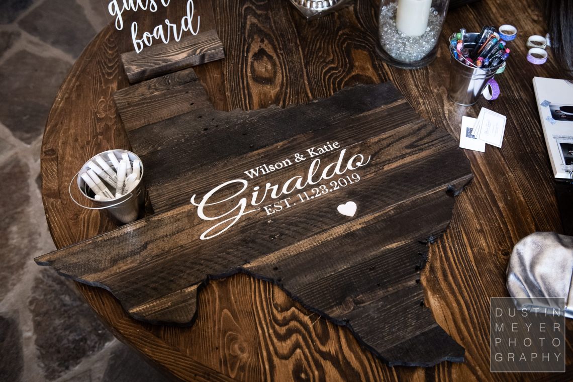 A custom personalized wedding sign-in "album" made of hill country natural wood.