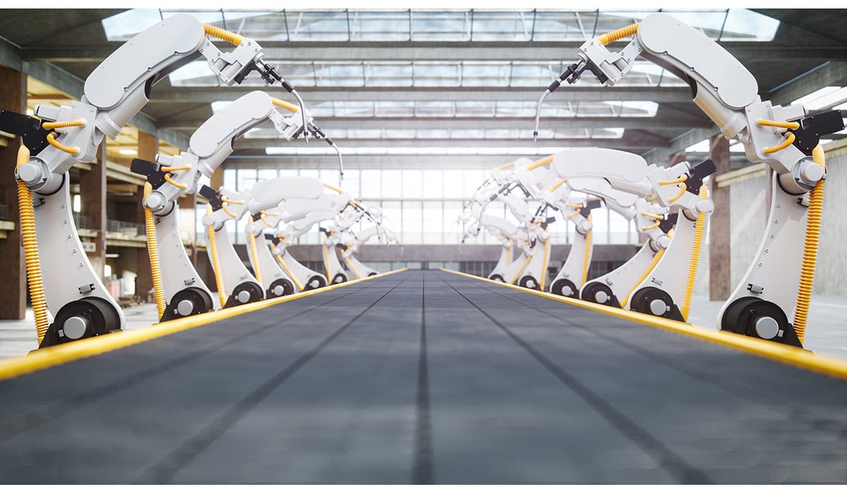 Welding Robots And Conveyor Belt In Automated Factory