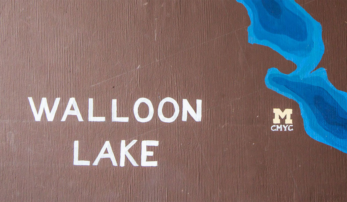 "Walloon Lake" spelled out on painting next to block M