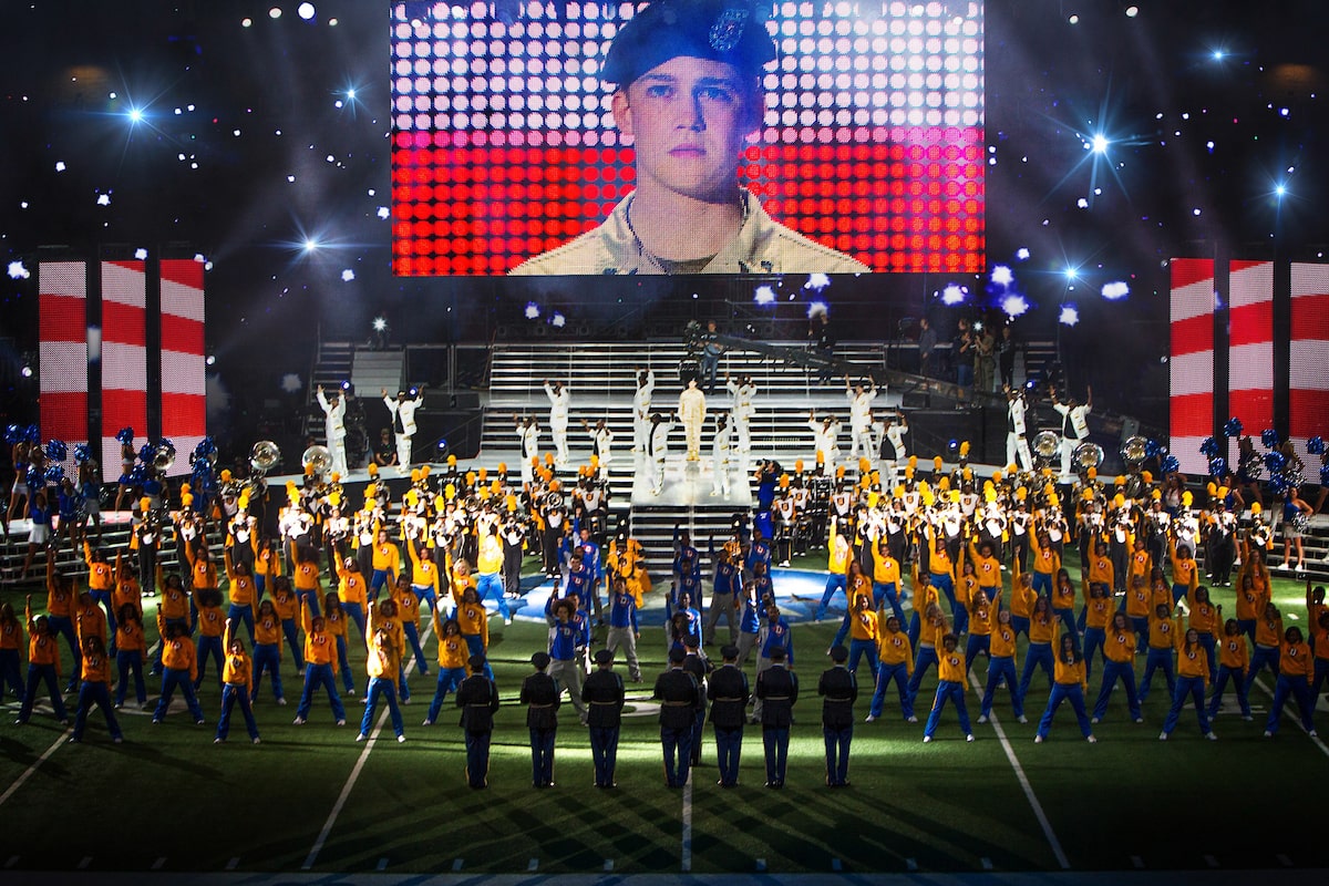 This image released by Sony Pictures shows Joe Alwyn, portraying Billy Lynn, on a screen in a scene from the film, "Billy Lynns Long Halftime Walk," in theaters on November 11. (Mary Cybulski/Sony-TriStar Pictures) © 2016 CTMG, Inc. All Rights Reserved. **ALL IMAGES ARE PROPERTY OF SONY PICTURES ENTERTAINMENT INC. FOR PROMOTIONAL USE ONLY. SALE, DUPLICATION OR TRANSFER OF THIS MATERIAL IS STRICTLY PROHIBITED.