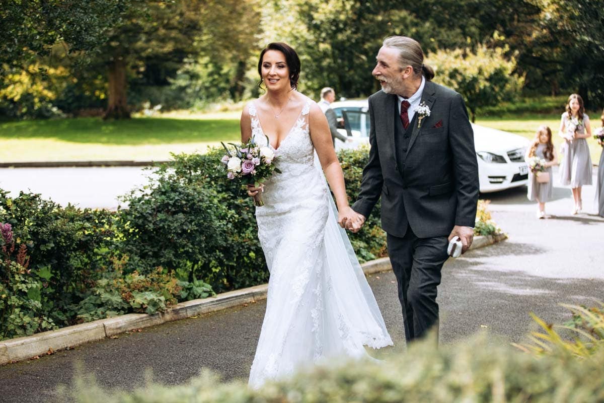 bride and father arriving