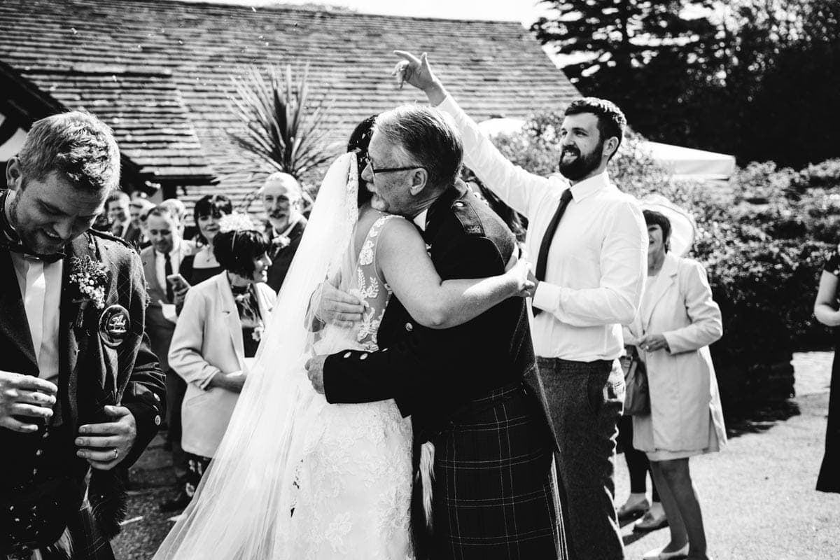 wedding party hugs