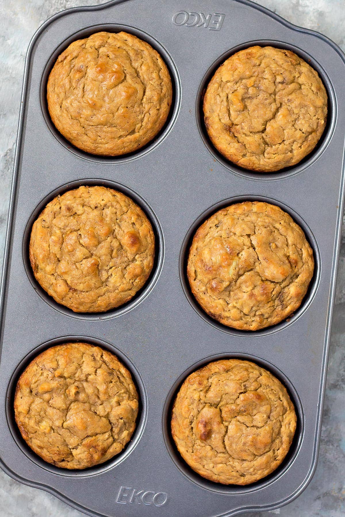 Baked Peanut Butter Banana Muffins in baking pan