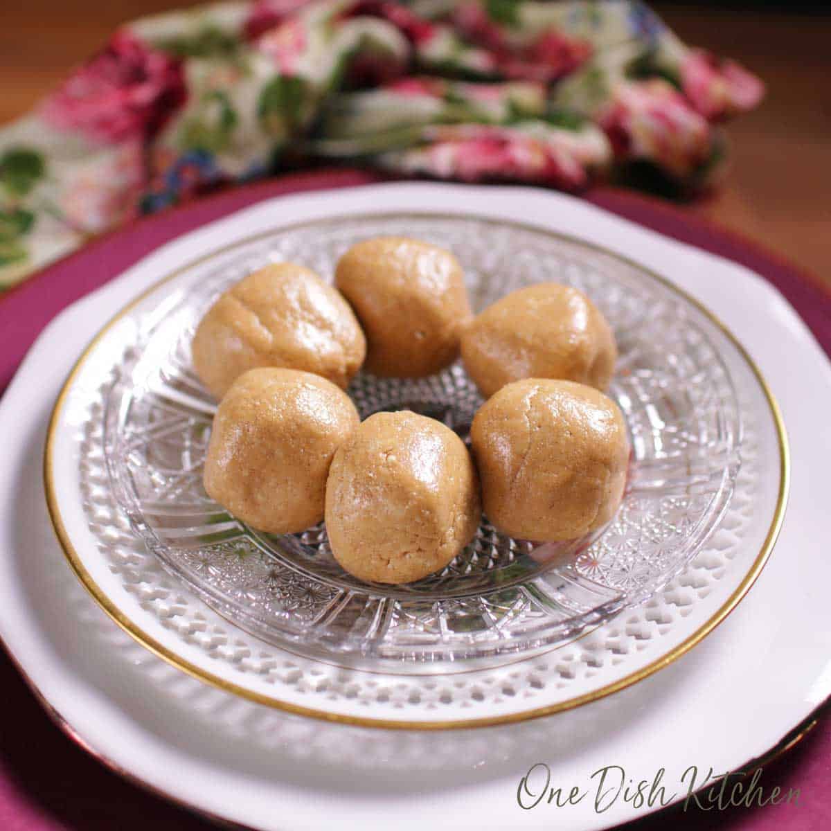 Six peanut butter balls on a plate