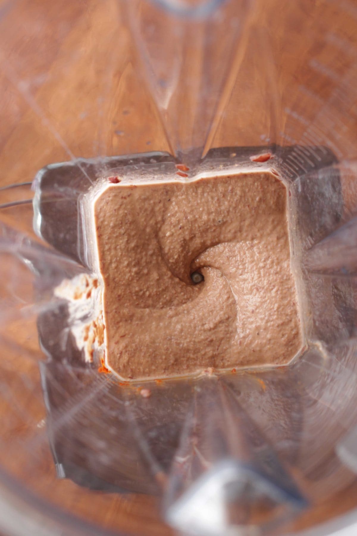 Black bean hummus pureed in a blender