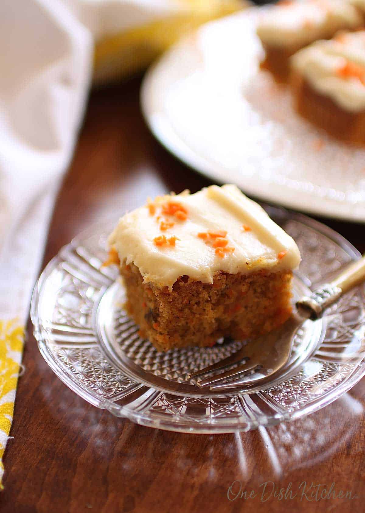 a square slice of carrot cake on a plate | one dish kitchen