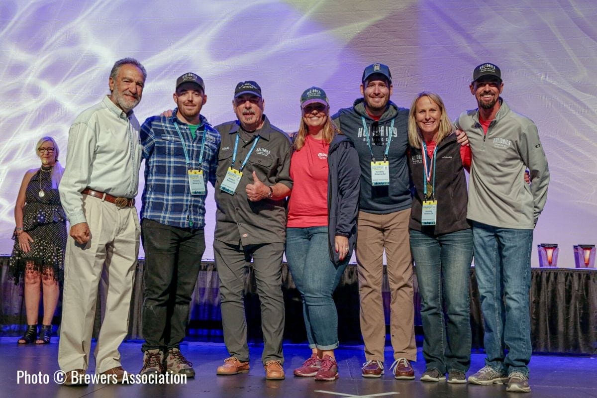 Holidaily Brewing Co accepting a gold medal at the Great American Beer Festival in 2019. Photo from the Brewer's Association.