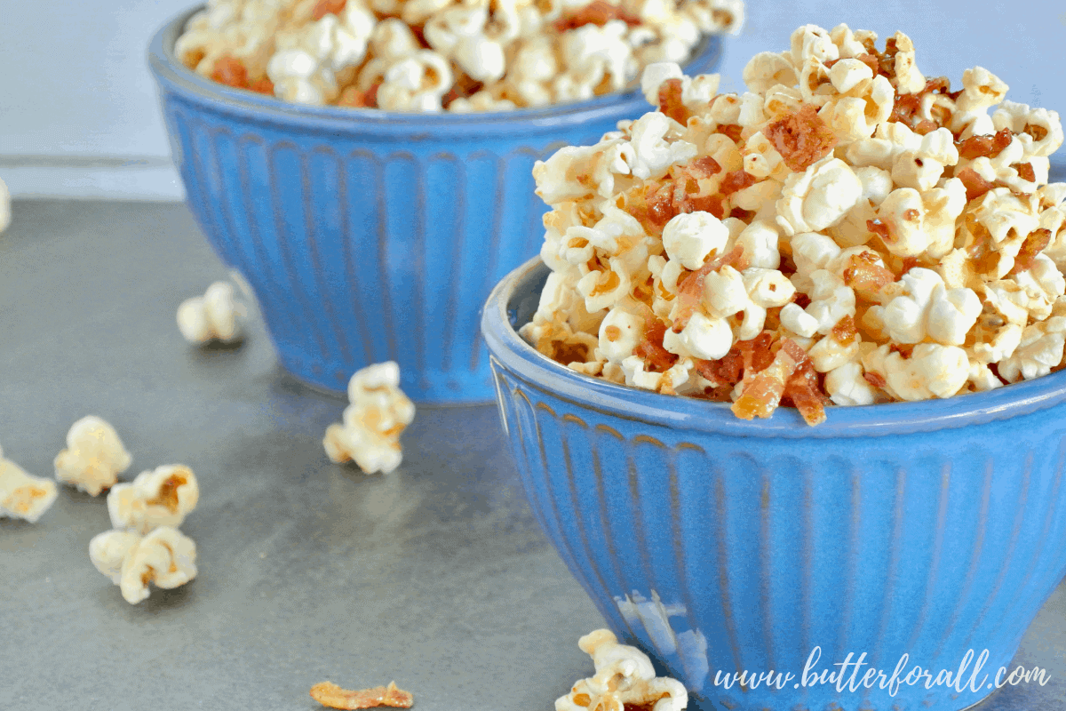 This light a fluffy Maple Bacon Caramel Corn has the perfect balance of sweet and salty. #realfood #popcorn #coconutoil #bacon #maple #caramel #sweetandsalty #sweetandsavory #baconforlife #healthyfats #moviesnacks