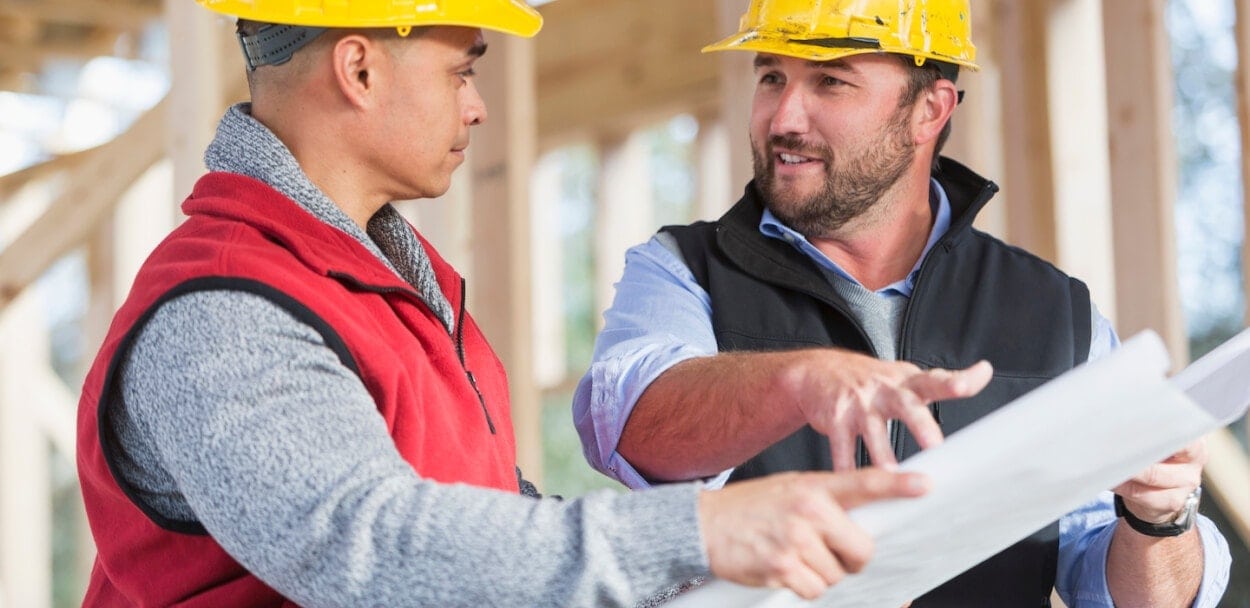 contractors reviewing plans