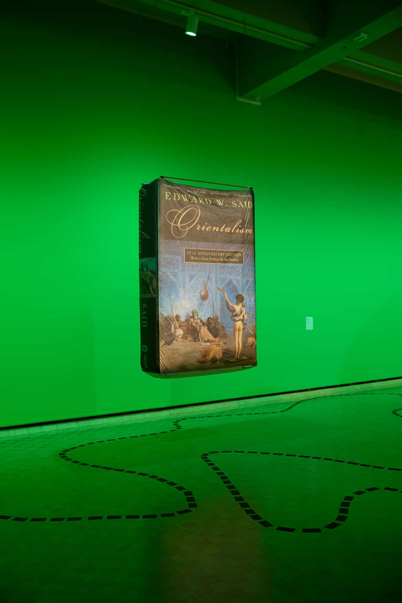 Divya Mehra, The World Isn’t a Fair Place: Just Barely Adrift on your perceived Cultural Landscape (The Browning of America and the Color of Crime), 2018, inflatable polyester book. Photo by Sarah Fuller. Image courtesy the artist and Georgia Scherman Projects.