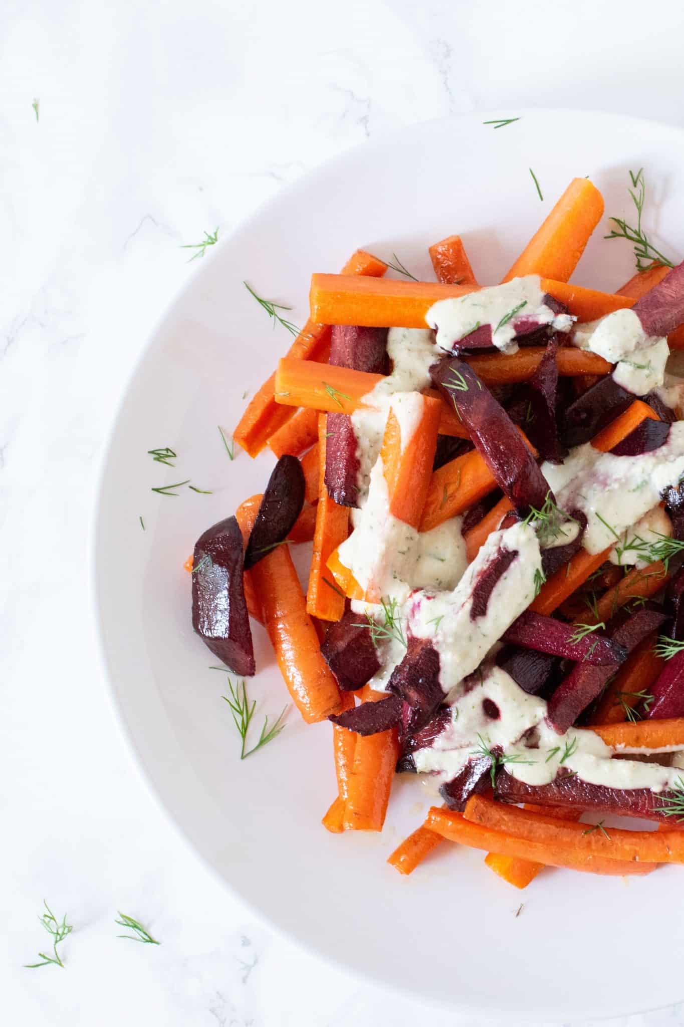 Roasted Beets Carrots With Creamy Garlic Dill Sauce Being