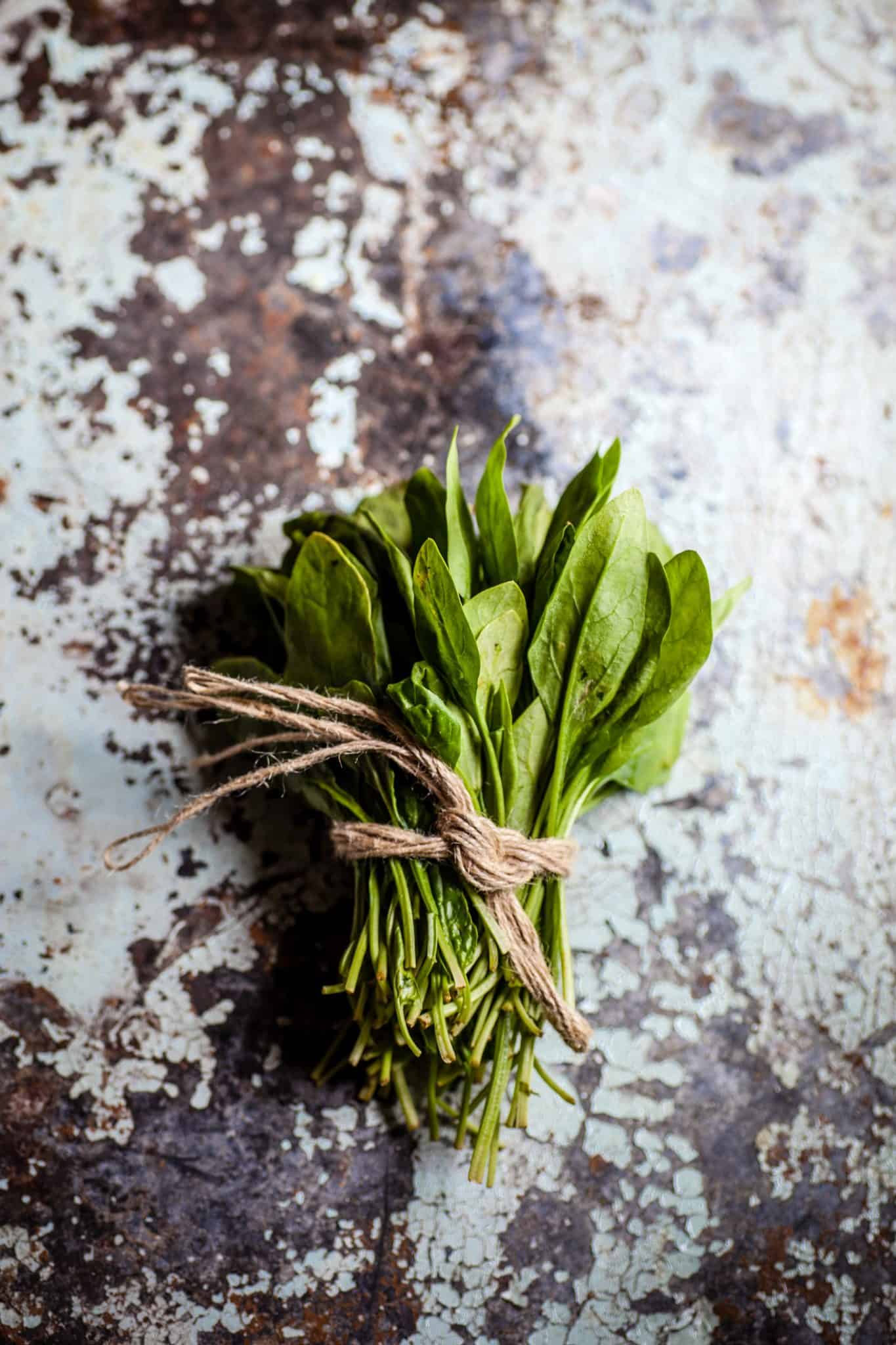 Spinach tied together with string