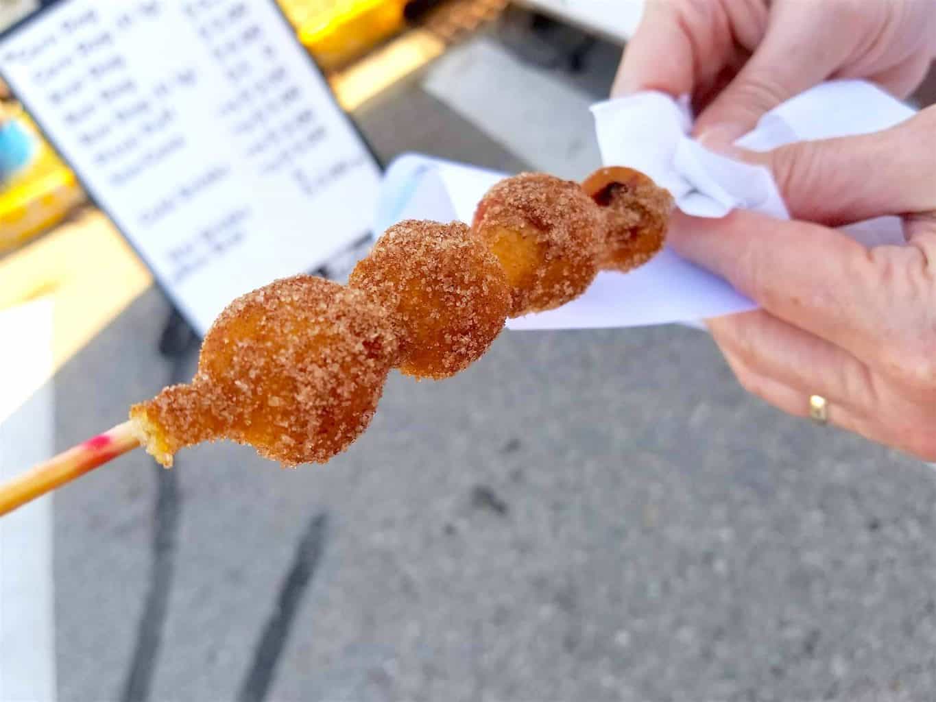The Cranberry Festival I Wasn't Expecting: Tips for Visiting deep fried cranberries on a stick